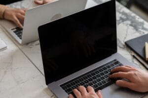 Web Design & Development Company - Klashtech Digital Agency Laptop screen representing WordPress vs Wix website builder comparison for small businesses